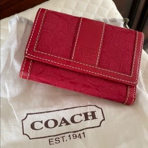 Red monogram Coach mini wallet